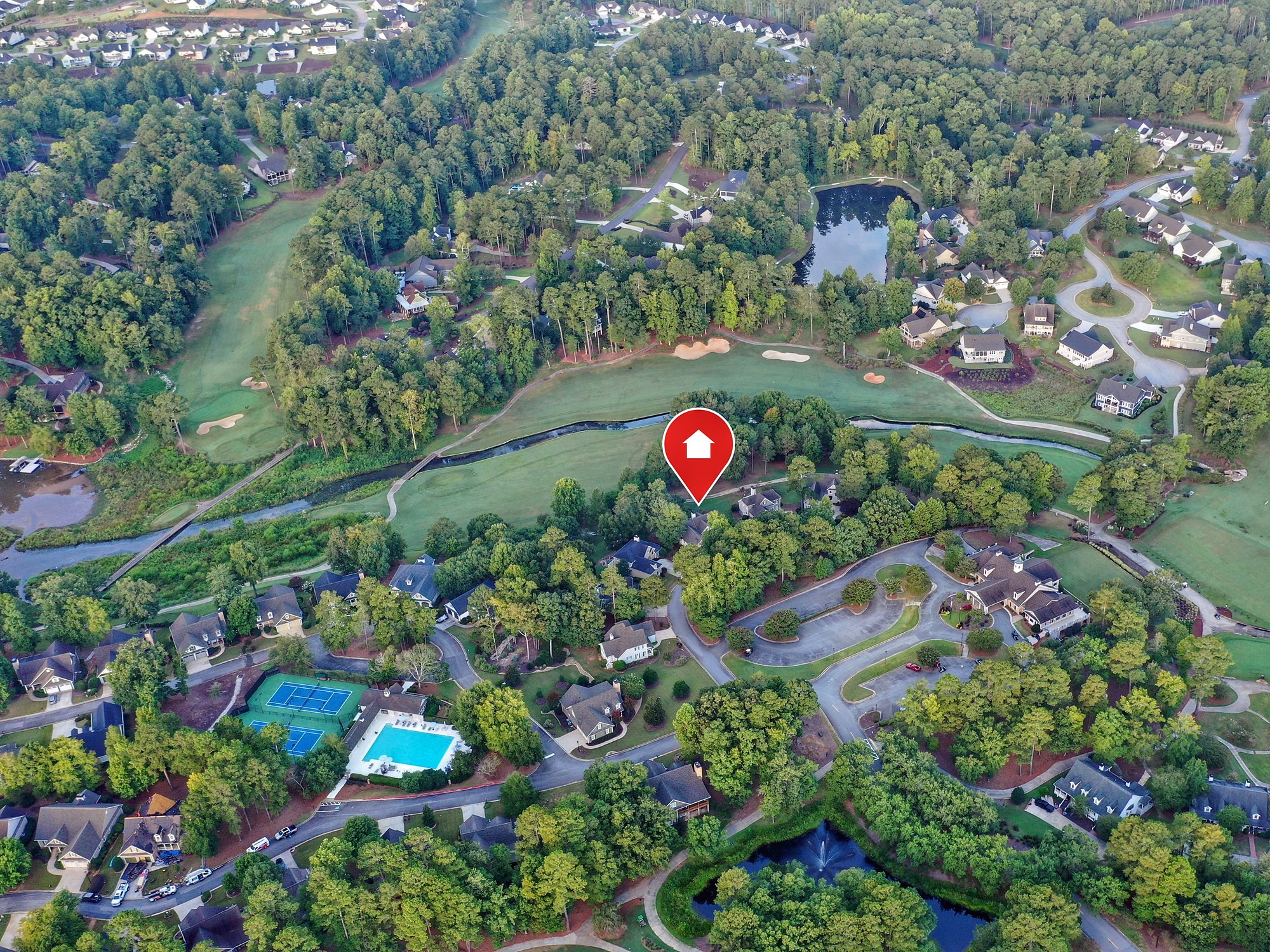 Aerial view of Harbor Club on Lake Oconee with a marker on 1030 Billy Mantle Lane on the 18th fairway, a short walk from the pool, tennis courts and clubhouse