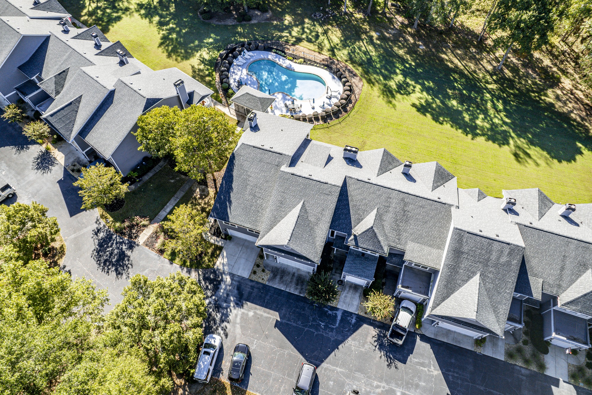 Aerial looking down on the Carriage Cove buildings and pool at Lake Oconee