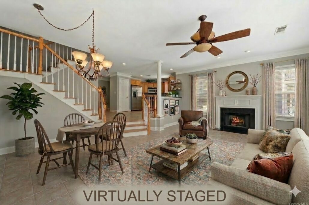 Virtually staged great room with a sofa and dining table in the same Lake Oconee condo at 181-A Farriers Lane