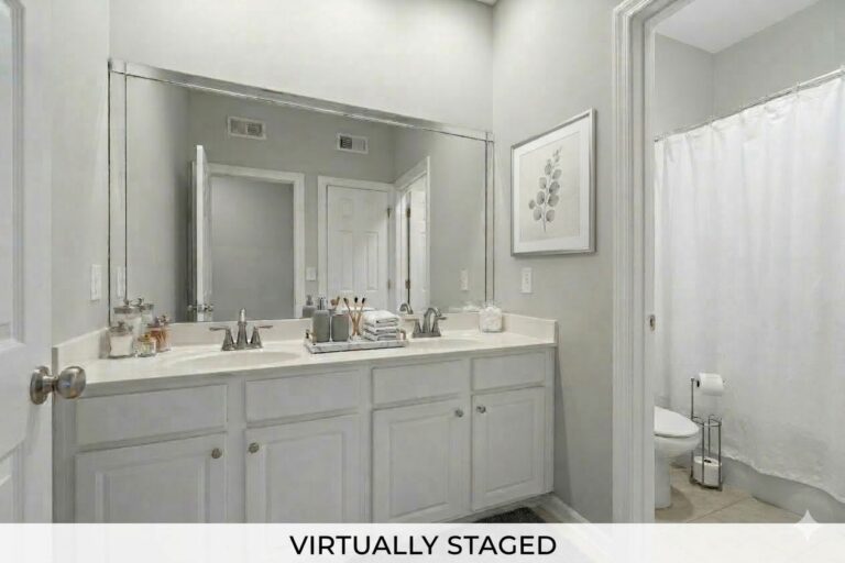 Virtually staged hall bath with a double vanity in a Lake Oconee condo