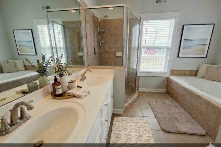 Virtually staged primary bathroom in the Lake Oconee condominium at 181-A Farriers Lane