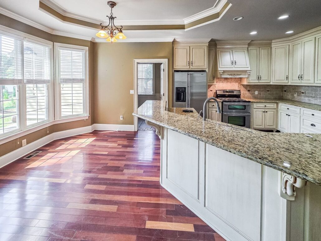 Breakfast area with bay windows beside the kitchen at 2750 Club Drive on Lake Oconee