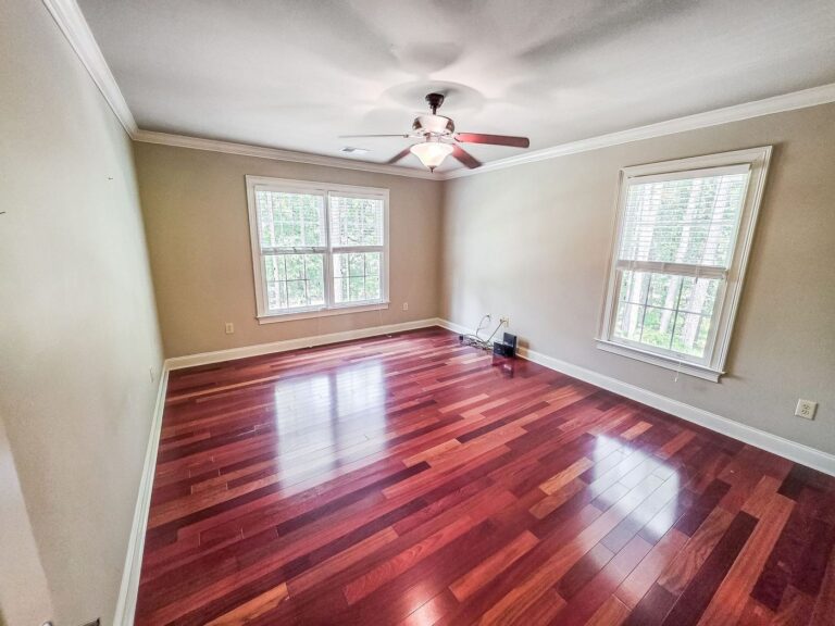 Second upstairs bedroom with windows on two walls at 2750 Club Drive in Harbor Club