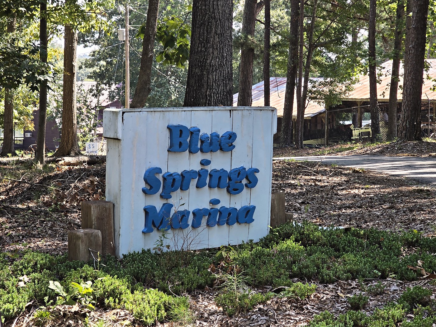 The hand-painted Blue Springs Marina sign on Blue Springs Drive at Lake Oconee in Buckhead, Morgan County, Georgia