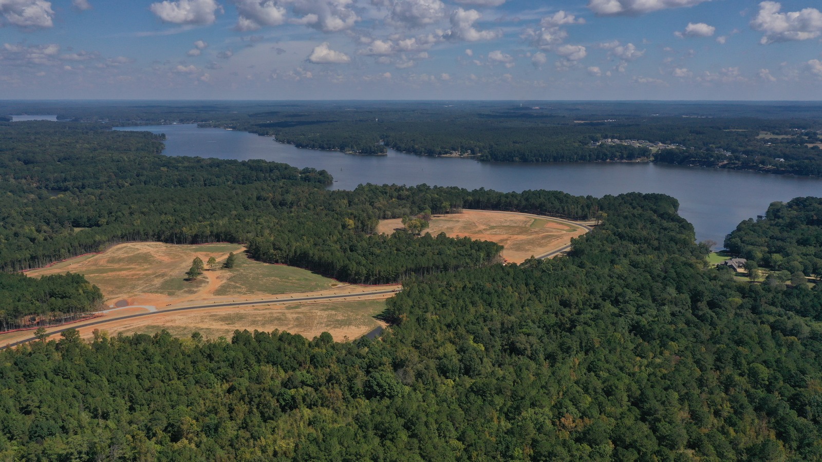 Aerial view of the meadows and preserved woodland at Camp Buckhead on Lake Oconee in Morgan County, Georgia