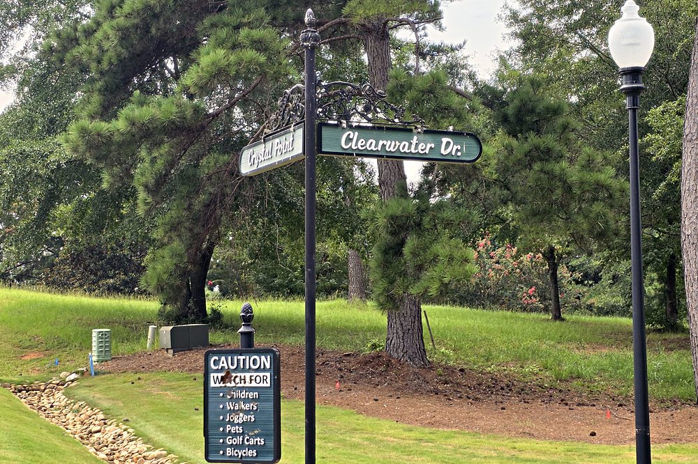 Crystal Point and Clearwater Drive street signs inside Emerald Shores at Lake Oconee