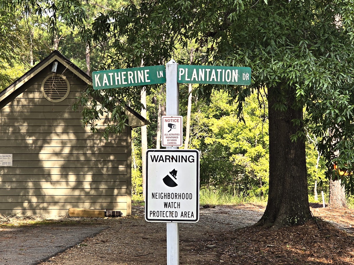 Street signs for Katherine Lane and Plantation Drive in Salem Plantation at Lake Oconee, Greensboro, Georgia