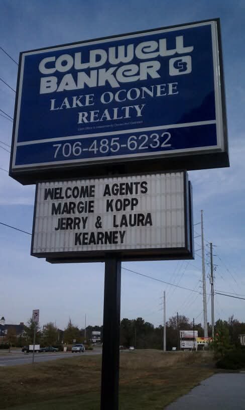Coldwell Banker Lake Oconee Realty sign welcoming new agent Margie Kopp in November 2010