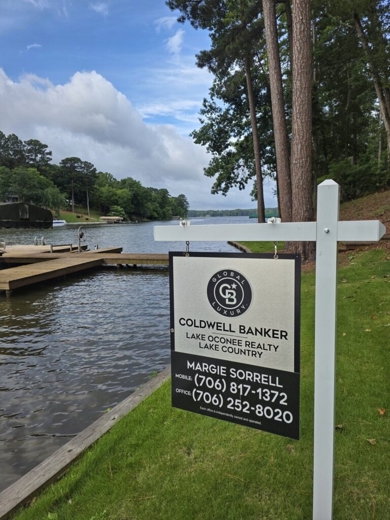 Margie Sorrell's Coldwell Banker sign at a Lake Oconee lakefront listing