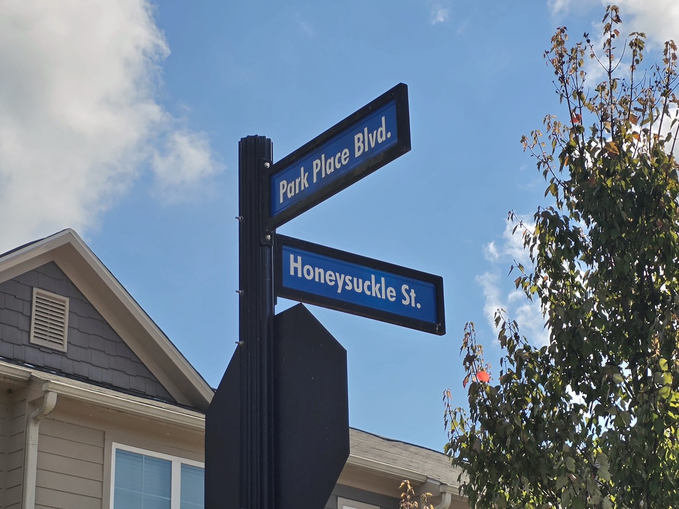 The Park Place Boulevard and Honeysuckle Street signs at Park Place at Lake Oconee in Greene County, Georgia