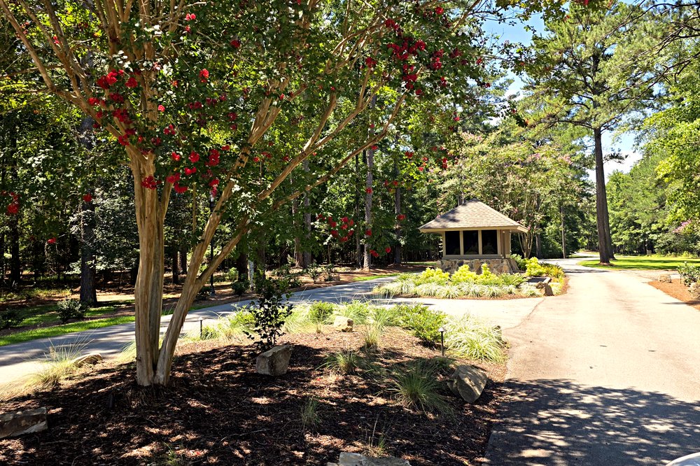 Landscaped entrance and guard house at the Richland subdivision on Lake Oconee