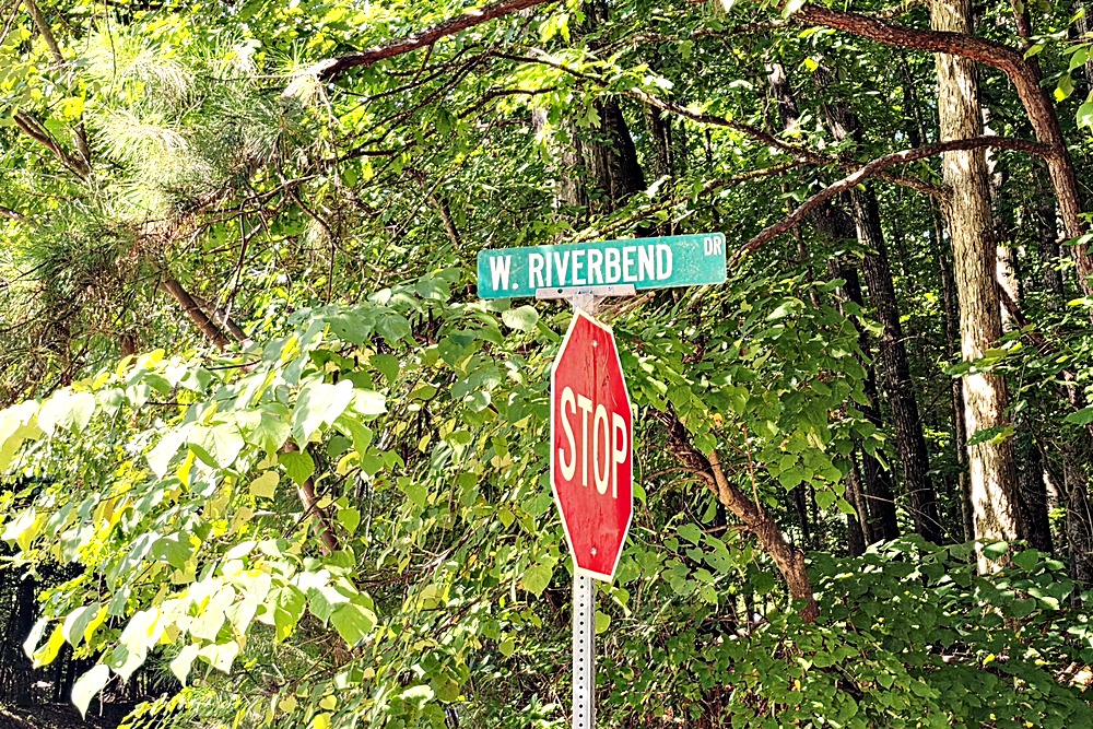 West Riverbend Drive street sign at the entrance to Riverbend Cove on Lake Oconee