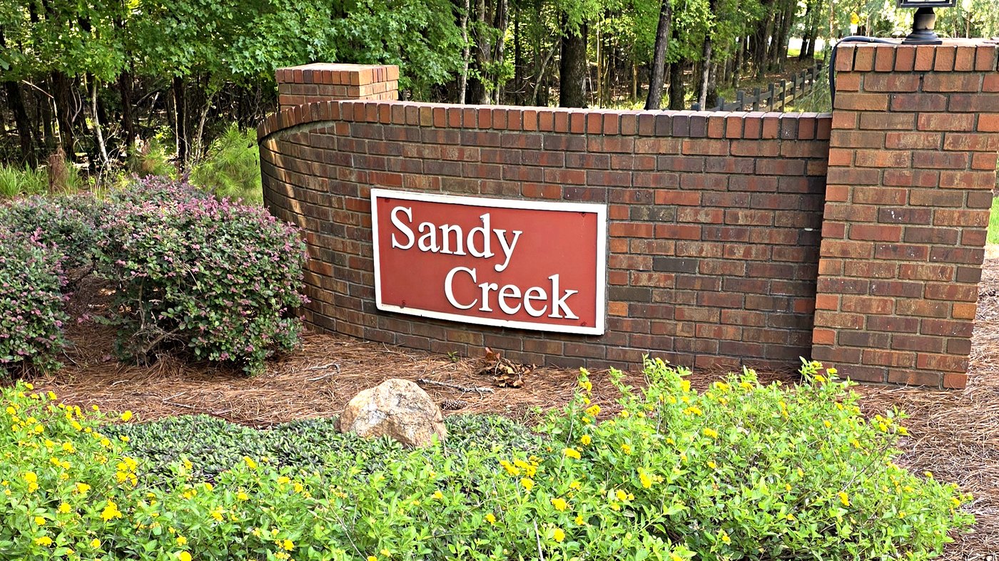 Sandy Creek subdivision brick entrance sign on the Richland side of Lake Oconee in Greene County, Georgia